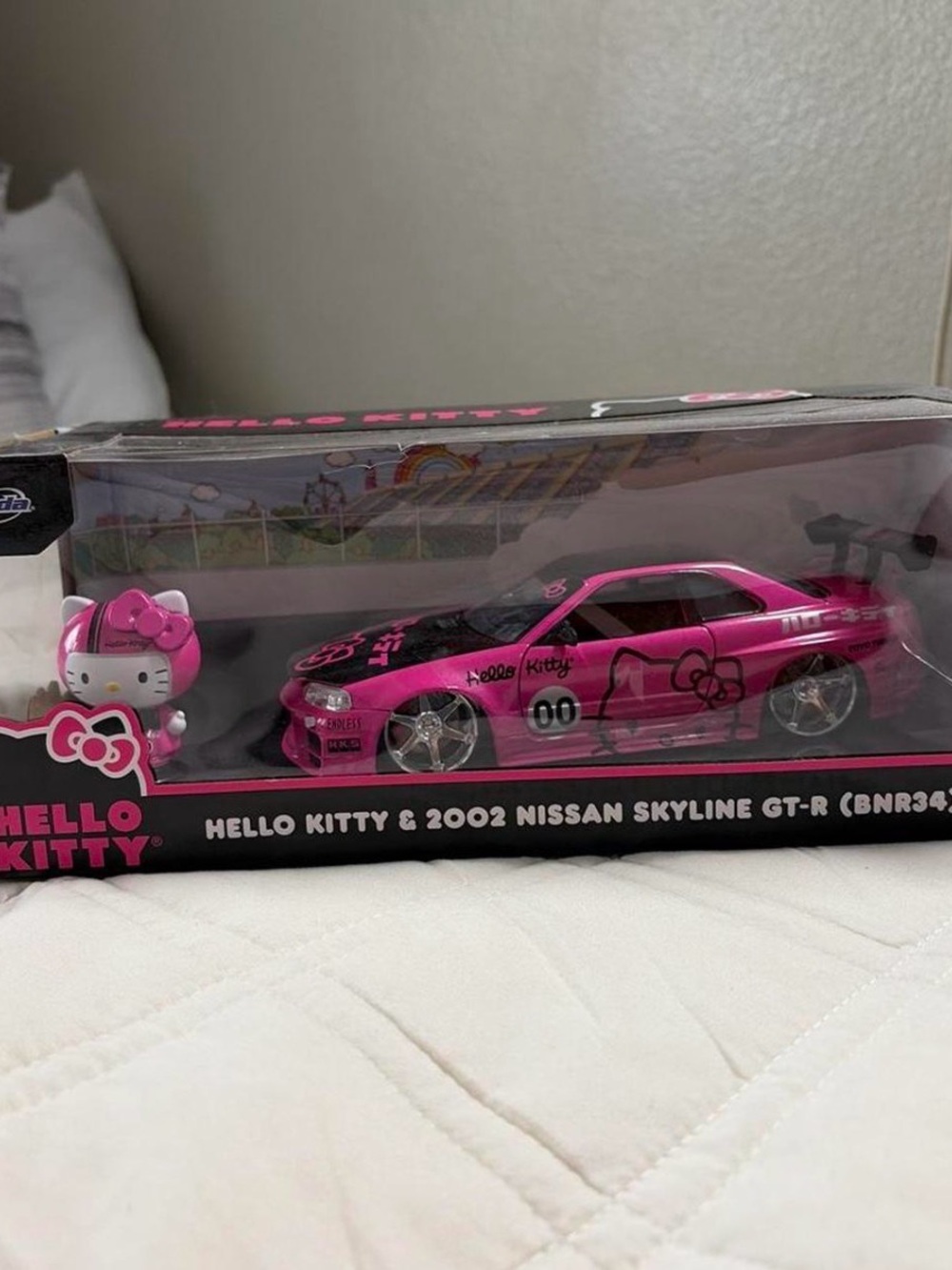 Hello Kitty Pink 2002 Nissan Skyline GT-R Die-Cast with Figure